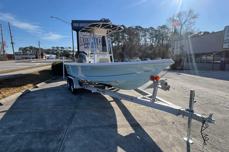 Slide: The Image of 2026 Bulls Bay 2200 boat on trailer in sunny outdoor setting. - 4