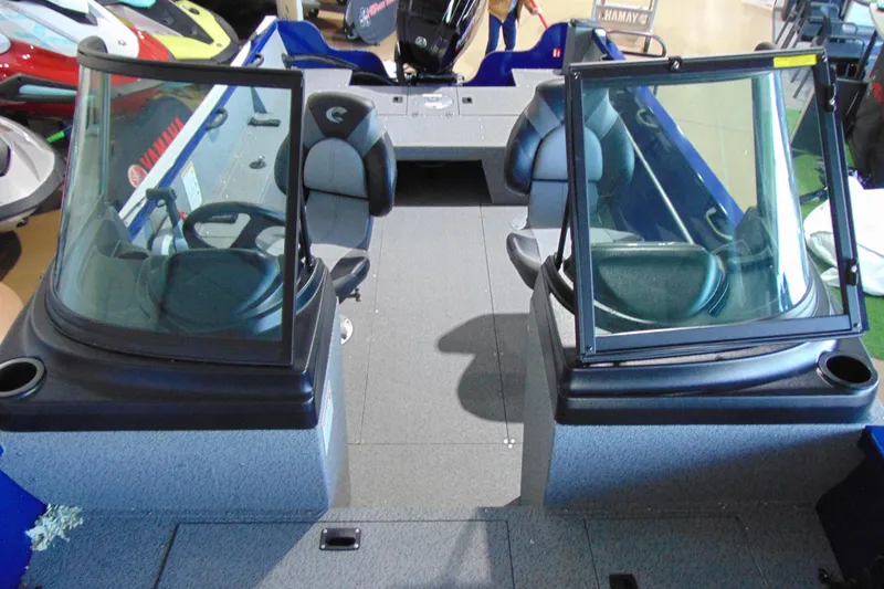 Slide: The Image of 2026 Crestliner 1850 Kodiak WT boat interior with dual windshields and seating. - 14