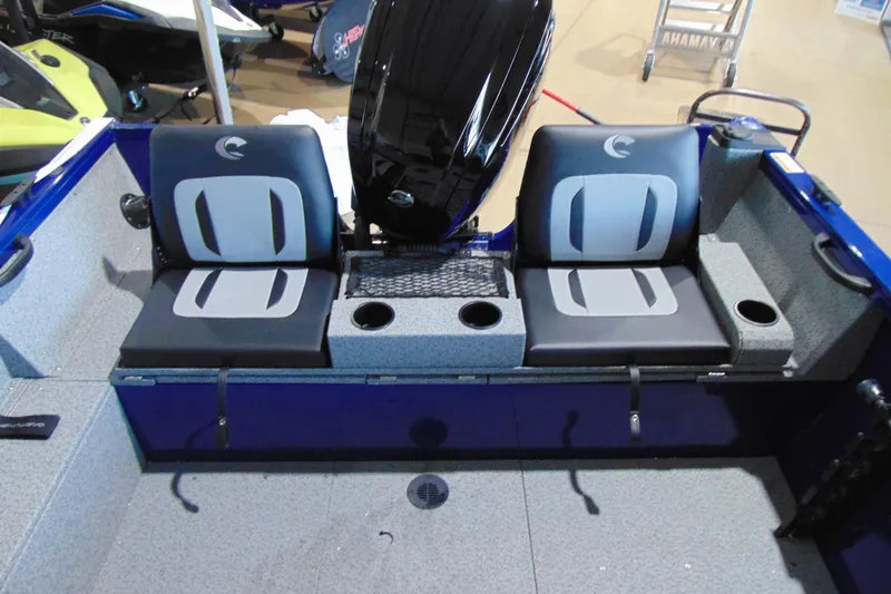 Slide: The Image of 2026 Crestliner 1850 Kodiak WT boat interior with dual seats and cup holders. - 16
