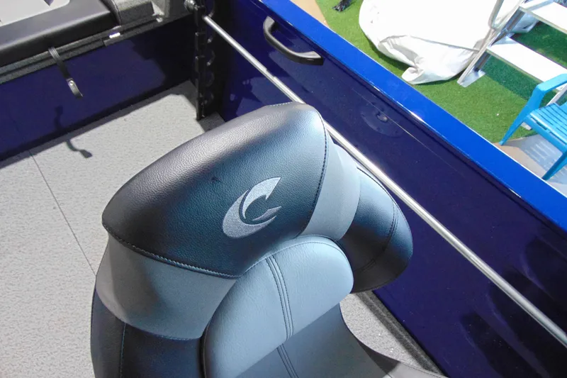 Slide: The Image of 2026 Crestliner 1850 Kodiak WT boat interior with branded seat and sleek design. - 17
