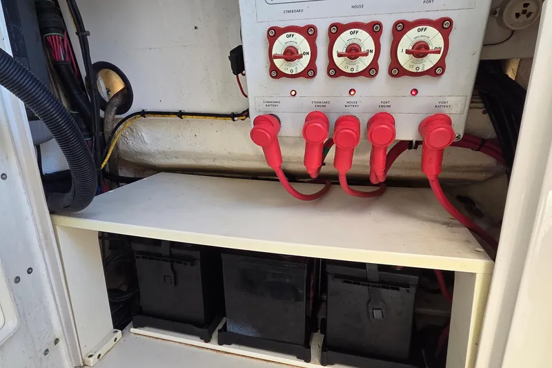 Slide: The Image of Electrical panel and battery compartment of 2015 Jupiter 30 FS boat. - 17