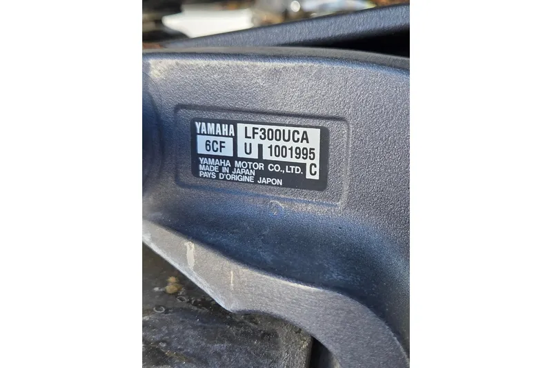 Slide: The Image of Yamaha motor label on a 2015 Jupiter 30 FS, model LF300UCA, made in Japan. - 26