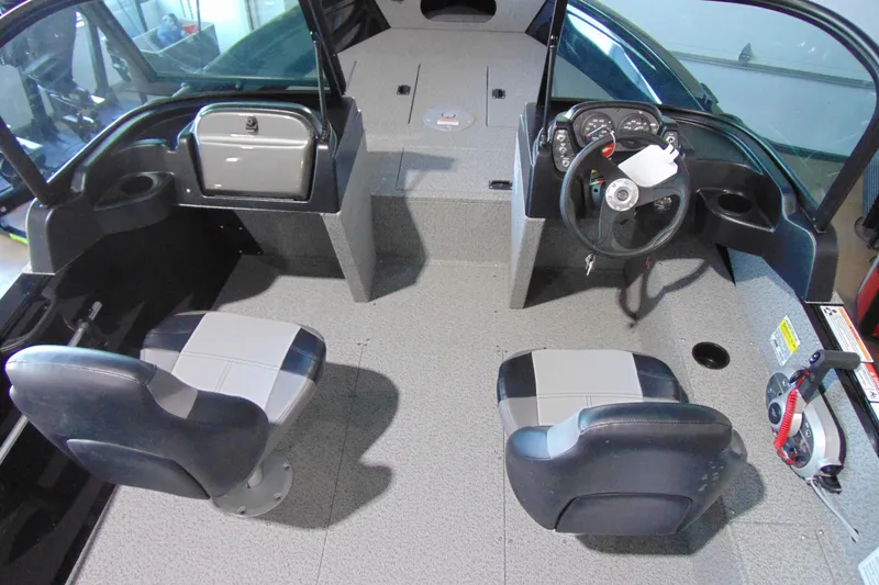 Slide: The Image of 2026 Crestliner 1850 Kodiak WT boat interior with dual seats and steering console. - 13