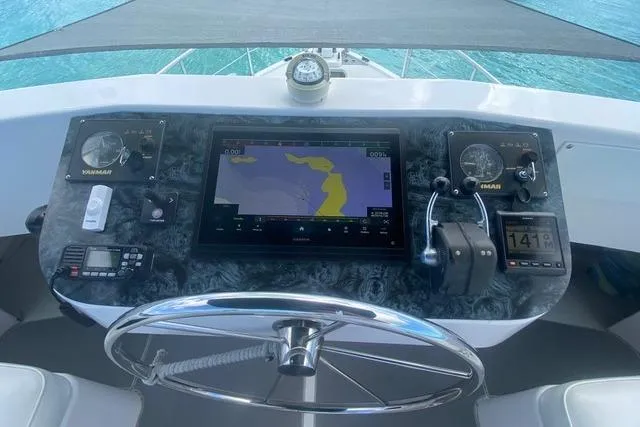 Slide: The Image of Cockpit of 2008 Great Harbour N37 with navigation equipment and steering wheel. - 10