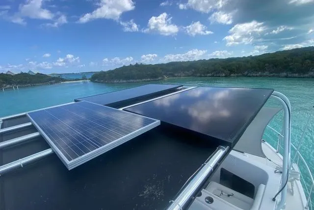 Slide: The Image of Solar panels on 2008 Great Harbour N37 yacht, scenic water and sky backdrop. - 14