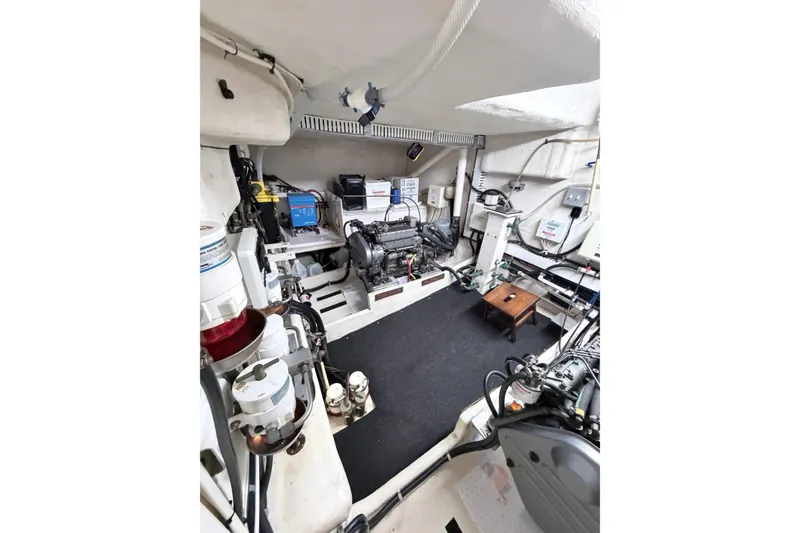 Slide: The Image of Engine room of a 2008 Great Harbour N37 boat, featuring various mechanical components. - 30