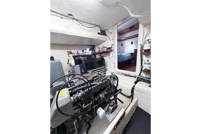 Slide: The Image of Engine room of 2008 Great Harbour N37 yacht, showing machinery and cabin entrance. - 33