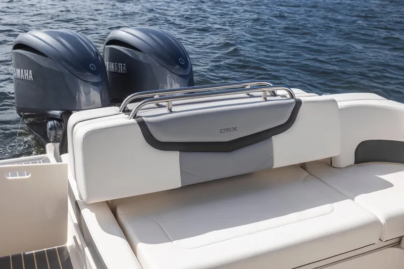 Slide: The Image of 2022 Chaparral 300 OSX boat with Yamaha engines on water. - 14