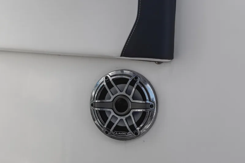 Slide: The Image of Speaker on 2022 Chaparral 300 OSX boat interior, featuring JL Audio design. - 23