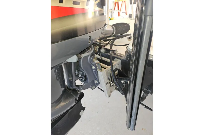 Slide: The Image of 2012 Sterling 220XS boat engine mount and components close-up. - 21