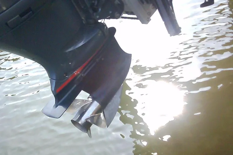 Slide: The Image of Sterling 220XS outboard motor over water, year 2012. - 26