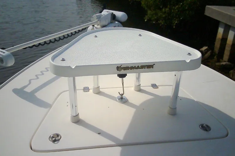 Slide: The Image of 2012 Sterling 220XS boat with a raised casting platform on calm water. - 39