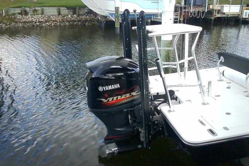 Slide: The Image of 2012 Sterling 220XS boat with Yamaha VMAX outboard motor on calm water. - 50