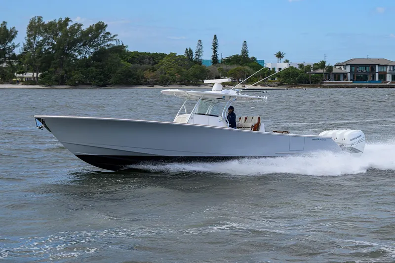 Slide: The Image of 2021 Valhalla Boatworks V-41 cruising on water, showcasing sleek design and powerful performance. - 10
