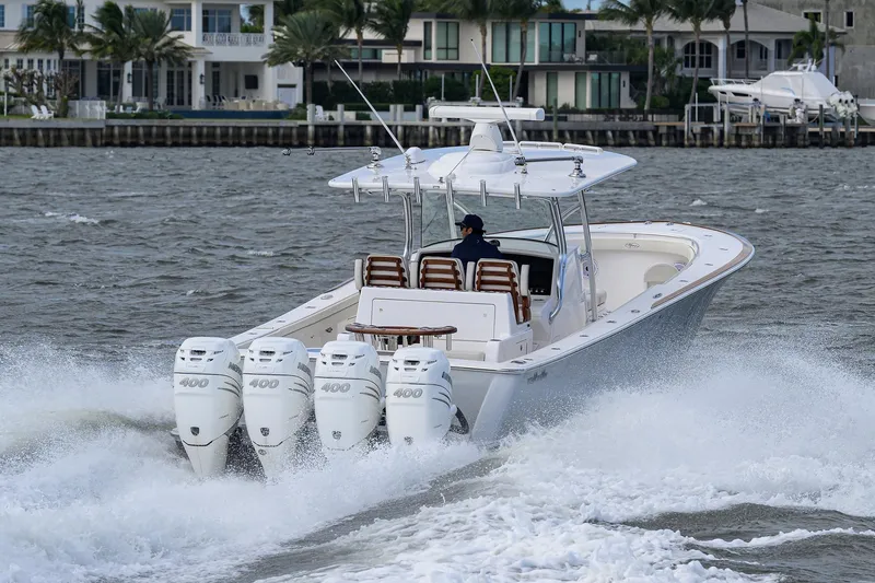 Slide: The Image of 2021 Valhalla Boatworks V-41 cruising with four powerful outboard engines. - 13