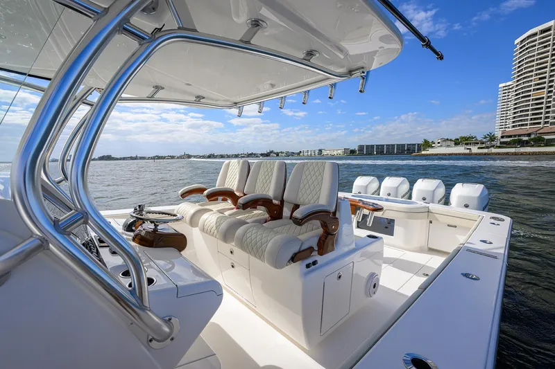 Slide: The Image of 2021 Valhalla Boatworks V-41 luxury boat interior with plush seating and ocean view. - 17