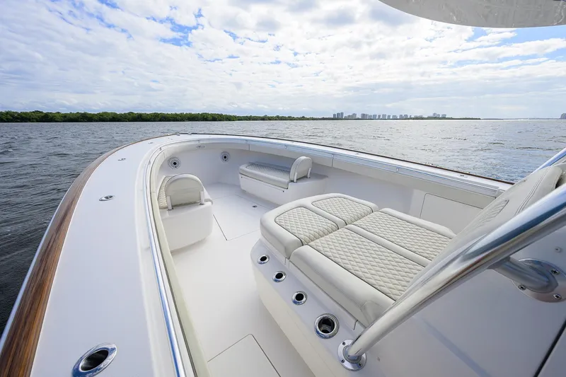 Slide: The Image of 2021 Valhalla Boatworks V-41 luxury deck with seating, overlooking serene waters. - 18