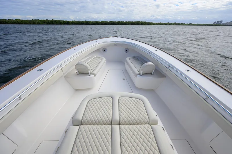 Slide: The Image of 2021 Valhalla Boatworks V-41 interior with luxurious seating on calm water. - 20