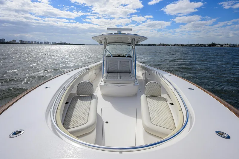 Slide: The Image of 2021 Valhalla Boatworks V-41 on water, showcasing luxurious seating and sleek design. - 28