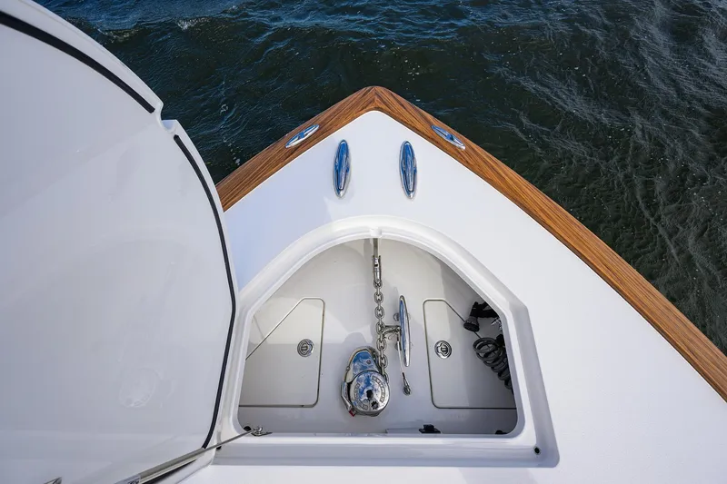 Slide: The Image of 2021 Valhalla Boatworks V-41 bow with anchor compartment, sleek design on water. - 29