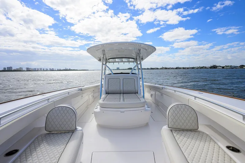Slide: The Image of 2021 Valhalla Boatworks V-41 on water, featuring spacious seating and clear blue skies. - 30