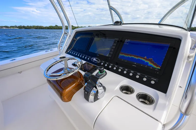 Slide: The Image of 2021 Valhalla Boatworks V-41 helm with advanced navigation displays and controls. - 33
