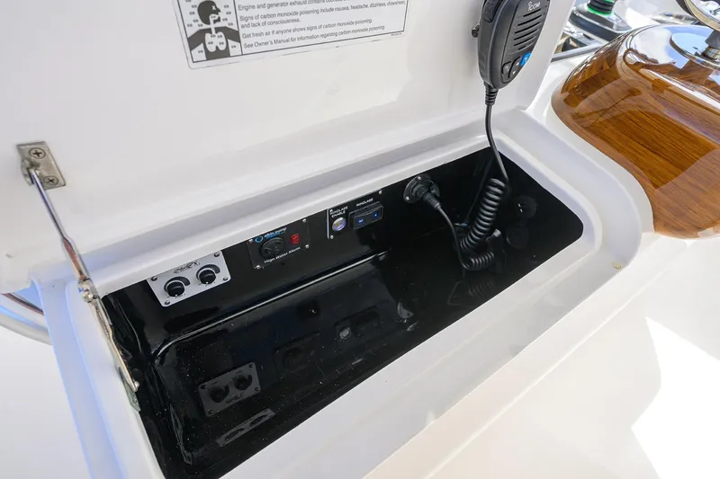 Slide: The Image of 2021 Valhalla Boatworks V-41 control panel with radio and switches. - 34