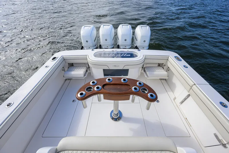 Slide: The Image of 2021 Valhalla Boatworks V-41 with quad engines, spacious deck, and fishing rod holders. - 36