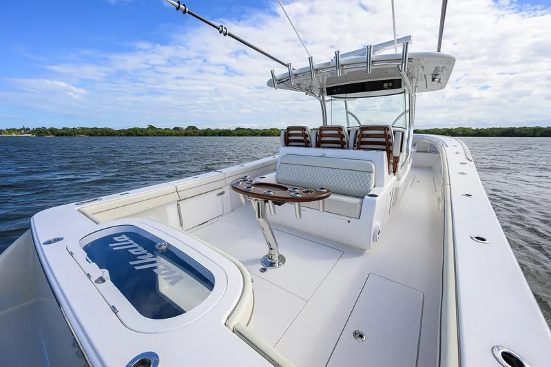 Slide: The Image of 2021 Valhalla Boatworks V-41 on water, featuring spacious deck and seating. - 37
