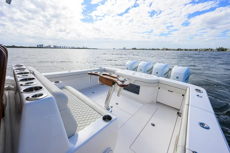 Slide: The Image of 2021 Valhalla Boatworks V-41 on water, featuring spacious deck and multiple outboard engines. - 40