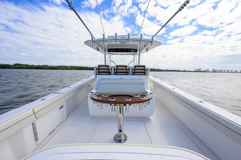 Slide: The Image of 2021 Valhalla Boatworks V-41 on open water, featuring spacious deck and seating. - 43