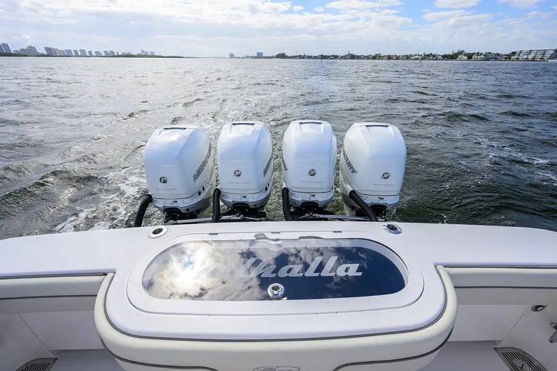 Slide: The Image of 2021 Valhalla Boatworks V-41 with four powerful outboard engines on open water. - 46