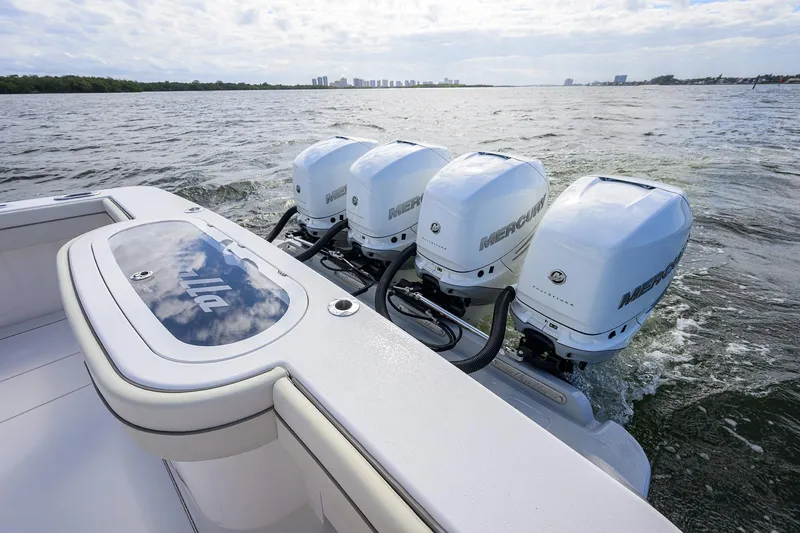 Slide: The Image of 2021 Valhalla Boatworks V-41 with four Mercury outboard engines on open water. - 47
