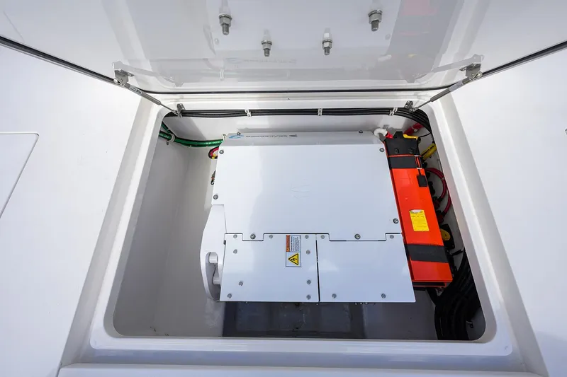 Slide: The Image of 2021 Valhalla Boatworks V-41 engine compartment with visible components and wiring. - 50