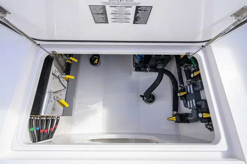 Slide: The Image of 2021 Valhalla Boatworks V-41 engine compartment with detailed plumbing and wiring. - 51