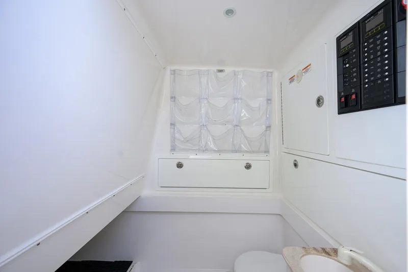 Slide: The Image of 2021 Valhalla Boatworks V-41 interior with control panel and storage compartments. - 52