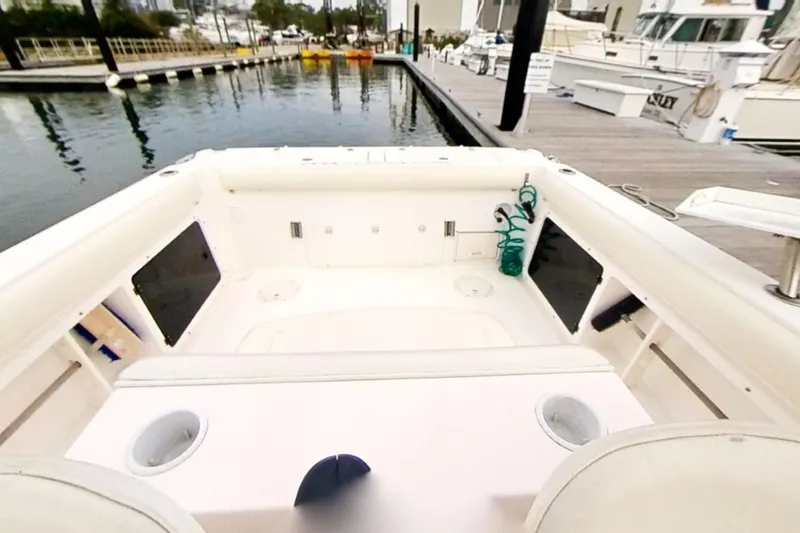 Slide: The Image of 2005 Shamrock 246 Adventurer boat interior at marina dock. - 7