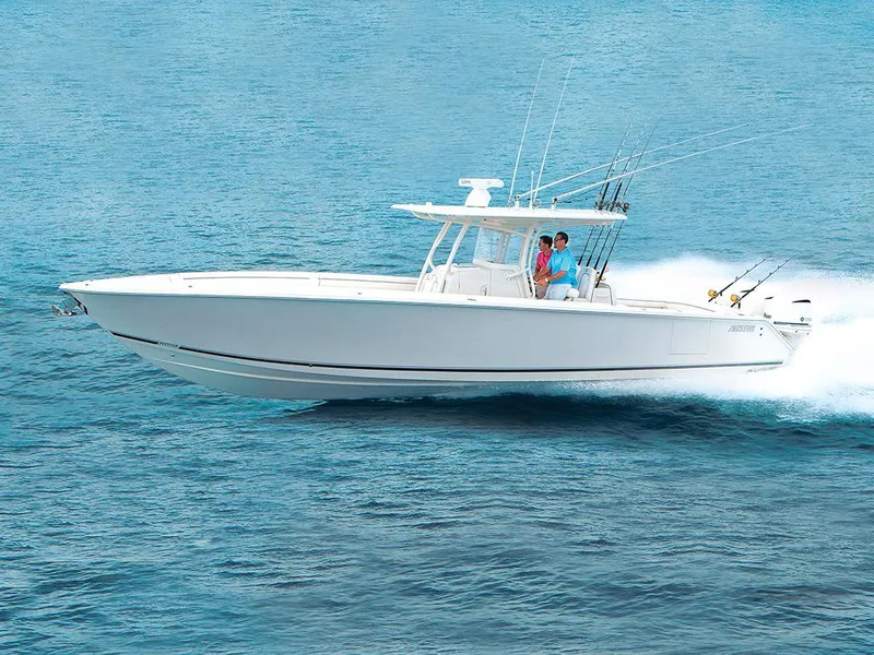 Slide: The Image of 2015 Jupiter 38 FS boat on water, featuring dual Yamaha engines and custom graphics. - 1
