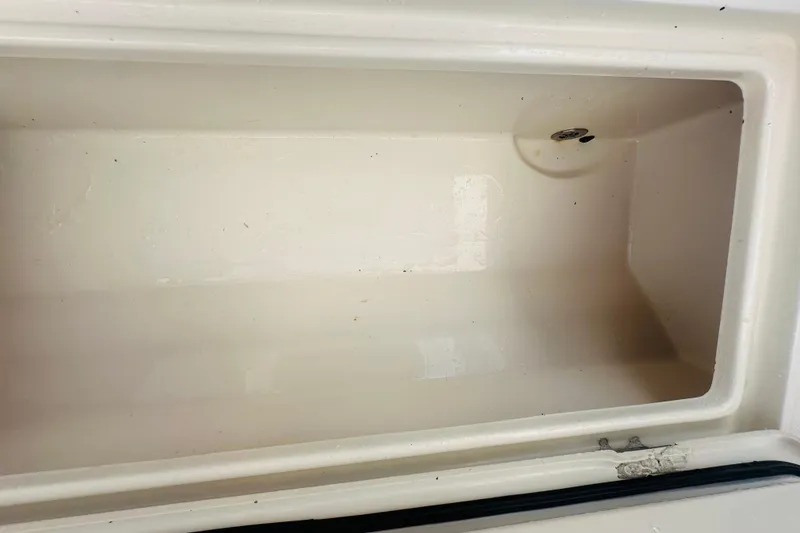 Slide: The Image of Empty storage compartment in 2015 Jupiter 38 FS boat. - 15