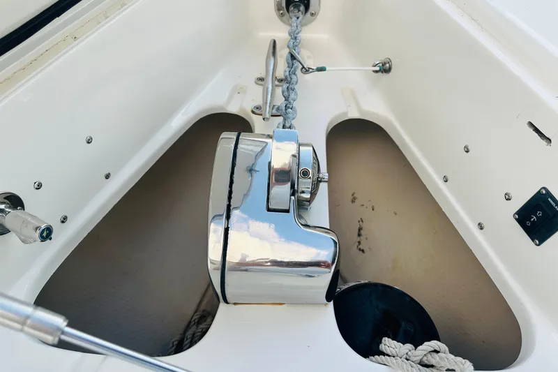 Slide: The Image of Anchor winch system on a 2015 Jupiter 38 FS boat deck. - 21