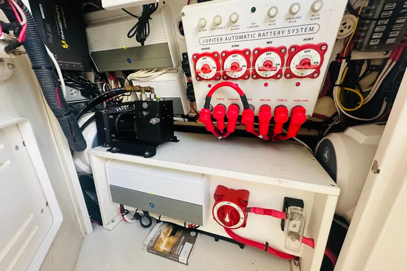 Slide: The Image of 2015 Jupiter 38 FS boat battery system with control panel and wiring. - 25