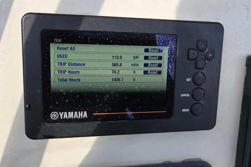 Slide: The Image of Yamaha display showing trip data on a 2020 Cobia 237 Center Console boat. - 14