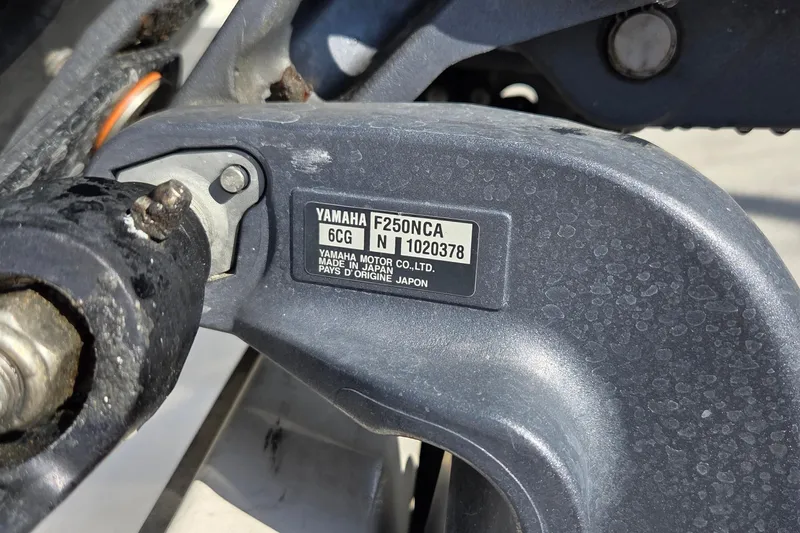 Slide: The Image of Yamaha F250NCA engine on 2020 Cobia 237 Center Console boat, close-up view. - 18