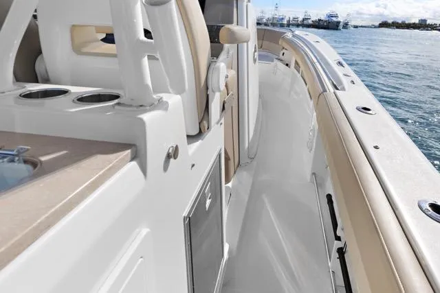 Slide: The Image of 2019 Sailfish 360 CC boat deck with seating and ocean view. - 24
