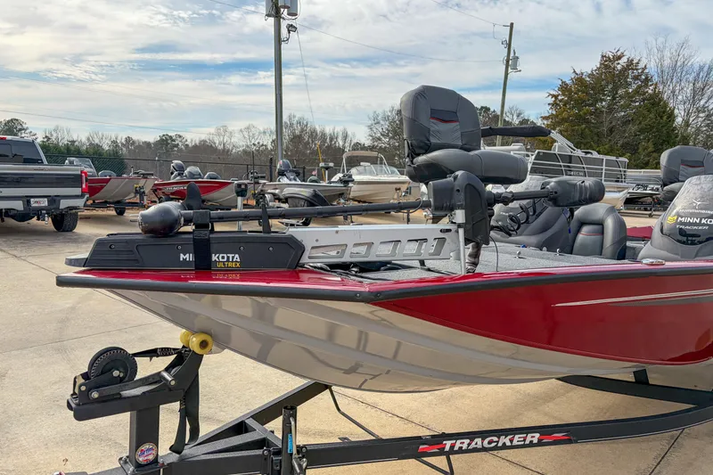 Slide: The Image of 2021 Tracker Pro Team 195 TXW boat on trailer, featuring Minn Kota Ultrex motor. - 13