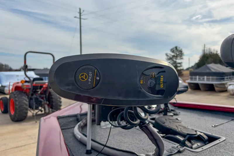 Slide: The Image of Trolling motor on 2021 Tracker Pro Team 195 TXW boat, outdoor setting. - 14