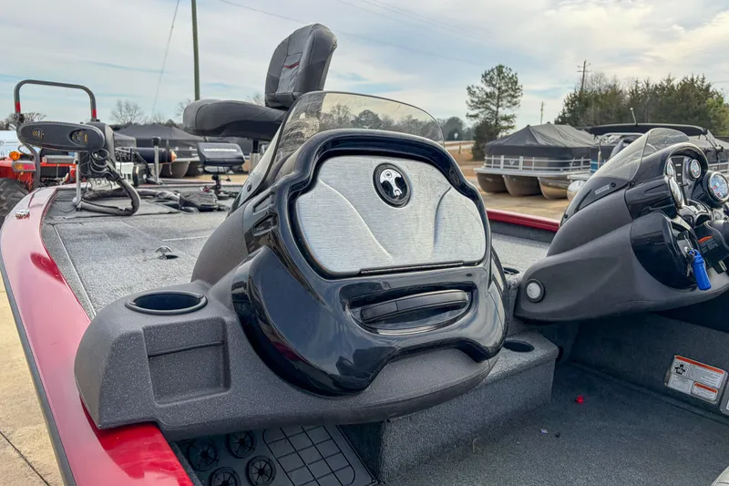 Slide: The Image of 2021 Tracker Pro Team 195 TXW boat interior with steering console and seating. - 15
