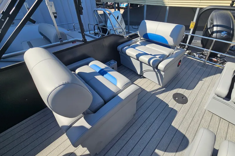 Slide: The Image of 2026 Bentley Pontoons LEGACY 243 QUAD SWINGBACK interior with luxurious seating and modern design. - 20