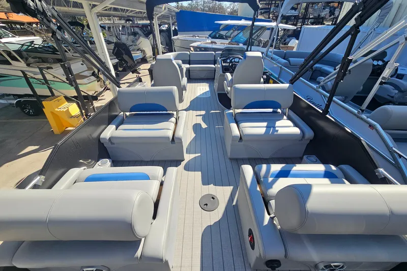 Slide: The Image of 2026 Bentley Pontoons LEGACY 243 QUAD SWINGBACK interior with luxurious seating and modern design. - 21