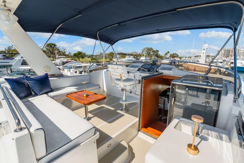 Slide: The Image of Luxurious 2008 DeFever 52 Euro yacht with spacious deck and elegant seating area. - 39